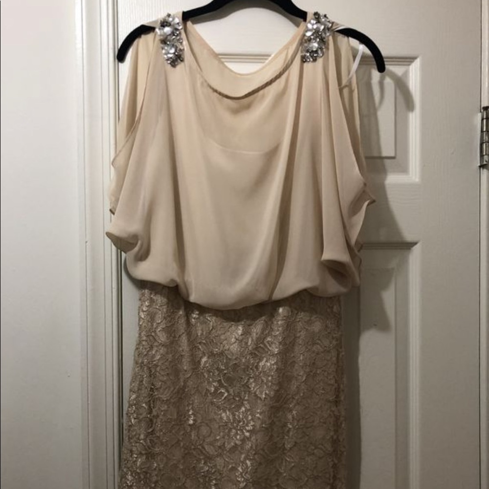 Cream lace dress.